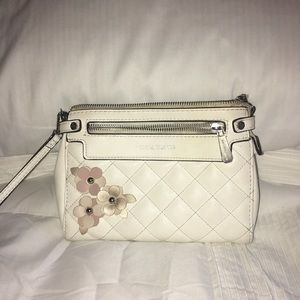 Cream colored hand bag